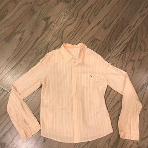 Orange and white striped button down shirt